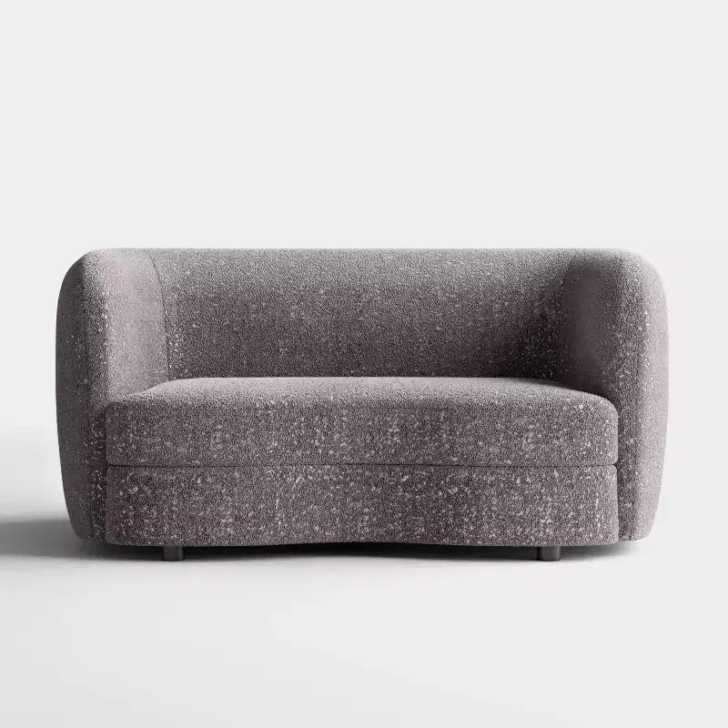 Divanetto curvo in tessuto bouclé Boho con cuscini a molle insacchettate