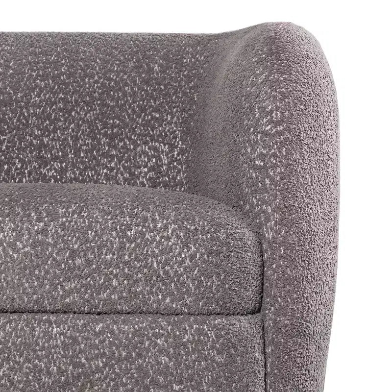 Divanetto curvo in tessuto bouclé Boho con cuscini a molle insacchettate