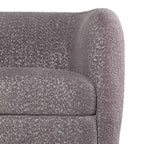 Divanetto curvo in tessuto bouclé Boho con cuscini a molle insacchettate