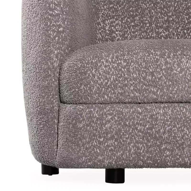 Divanetto curvo in tessuto bouclé Boho con cuscini a molle insacchettate