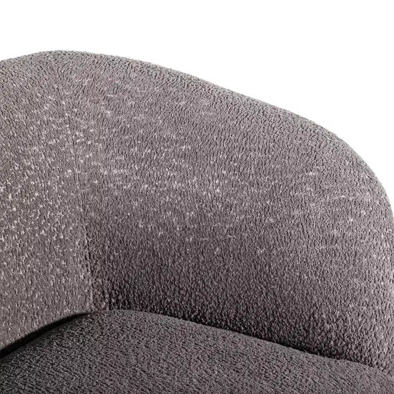 Divanetto curvo in tessuto bouclé Boho con cuscini a molle insacchettate
