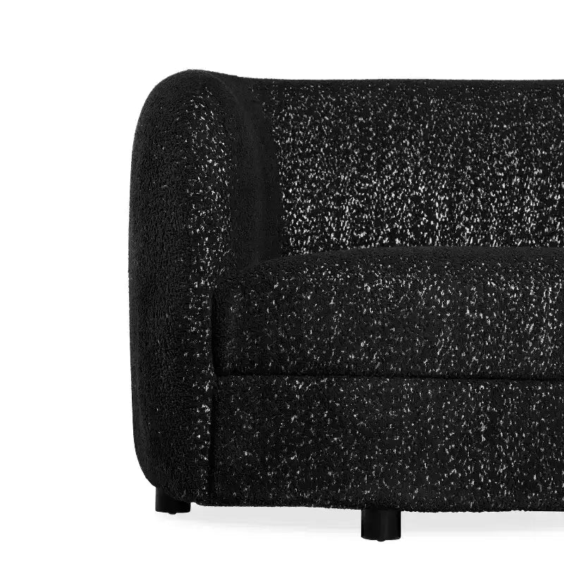 Divanetto curvo in tessuto bouclé Boho con cuscini a molle insacchettate