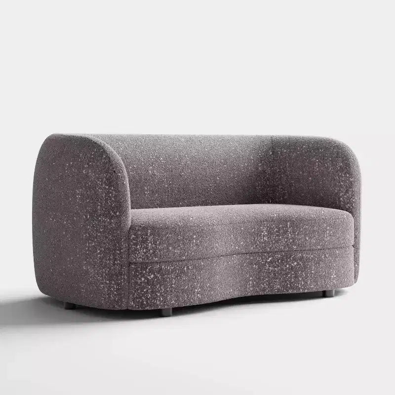 Divanetto curvo in tessuto bouclé Boho con cuscini a molle insacchettate
